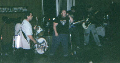 The band playing live. Not the best quality pic but it's a new one. May 28, 2005